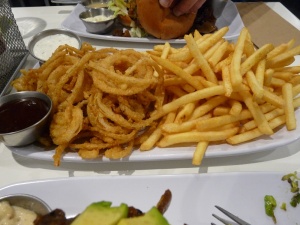 Onion strings and fries "fifty-fifty" (half portion of each)
